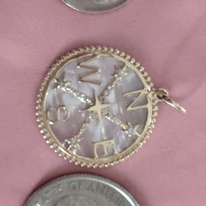 18k gold & mother of peril pendant. New wo tags